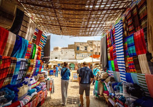 tourists-walking-through-moroccan-market-of-colour-2024-11-25-20-56-07-utc-compressed